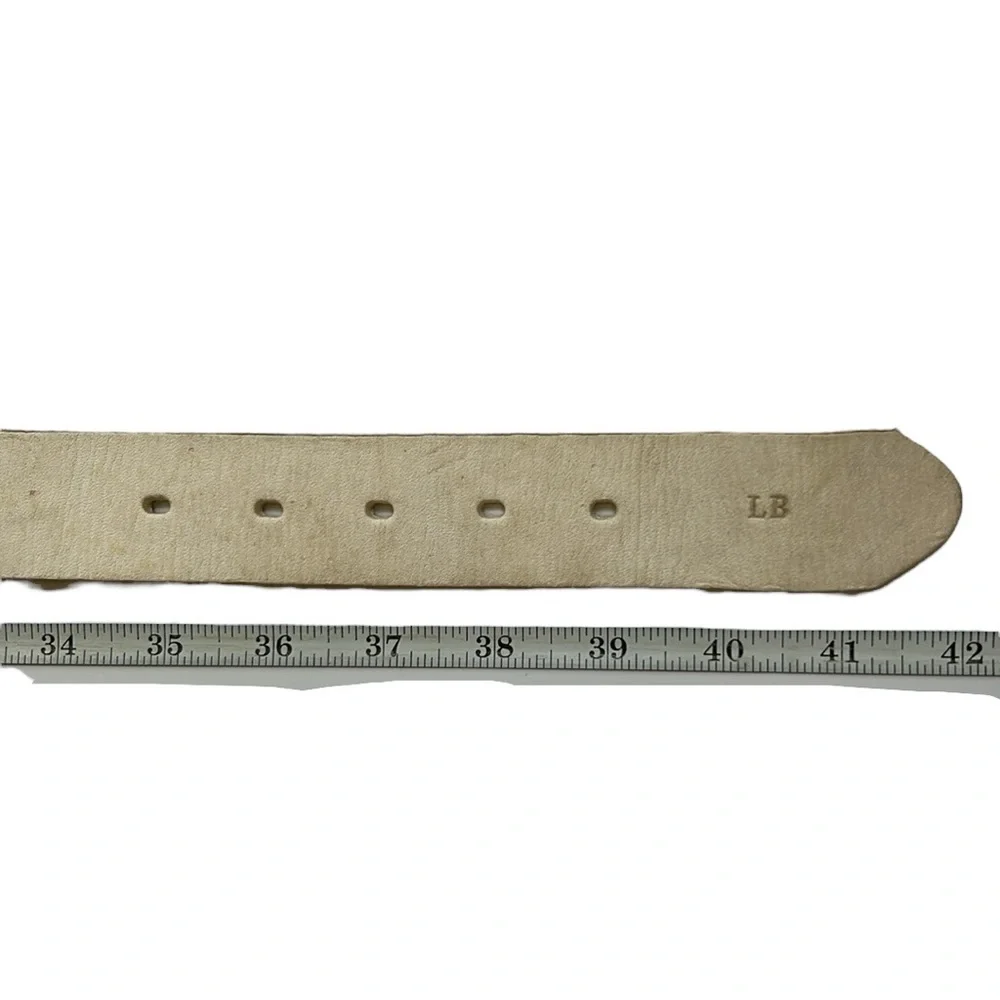 Stick & Ball Corrento Size Large off white leather polo belt. Brass buckle.‎